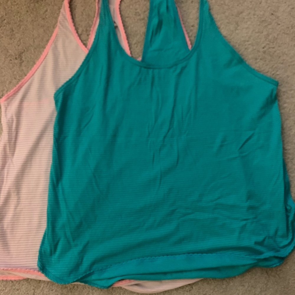 Two Lululemon tanks size 12